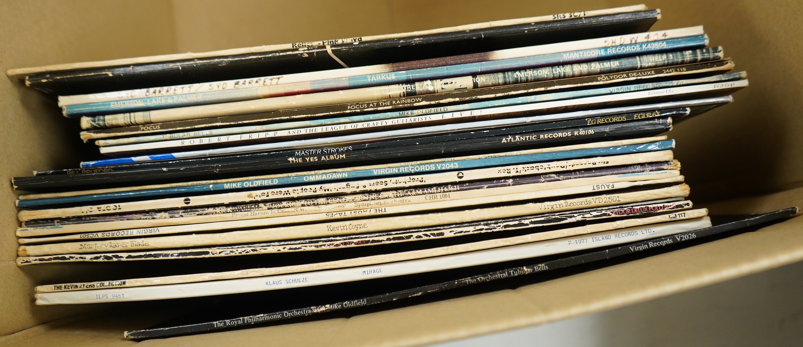 Twenty-three LP record albums, artists including Pink Floyd, Syd Barrett, Emerson Lake & Palmer, Mike Oldfield, Yes, Tyrannosaurus Rex, Kevin Ayers, etc.